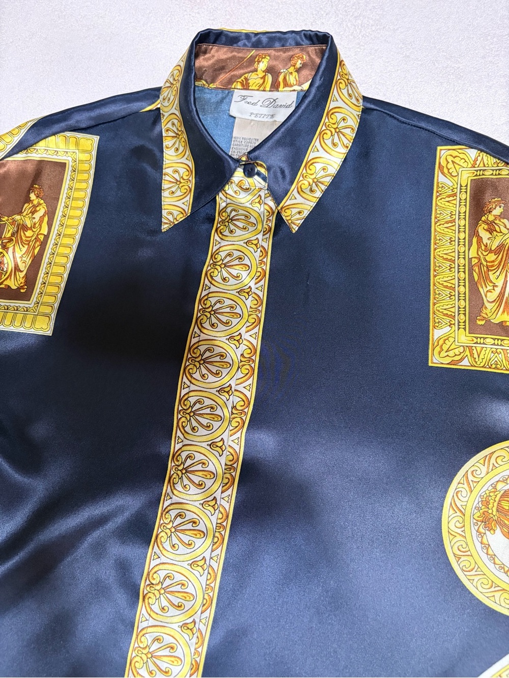 Fred David Black ( or dark navy —- hard to  tell) Silky Polyester with Gold .